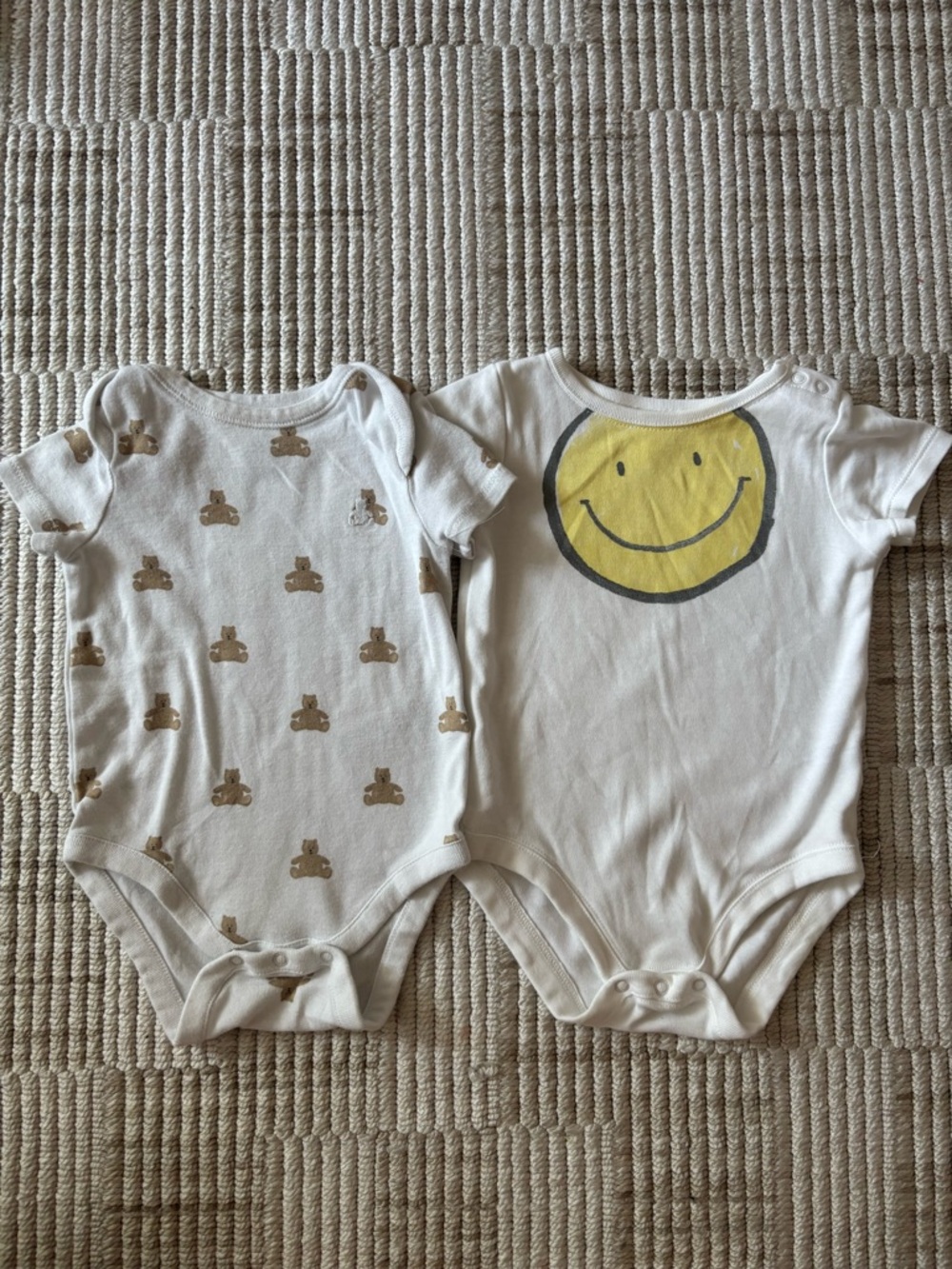 2 baby bodysuits